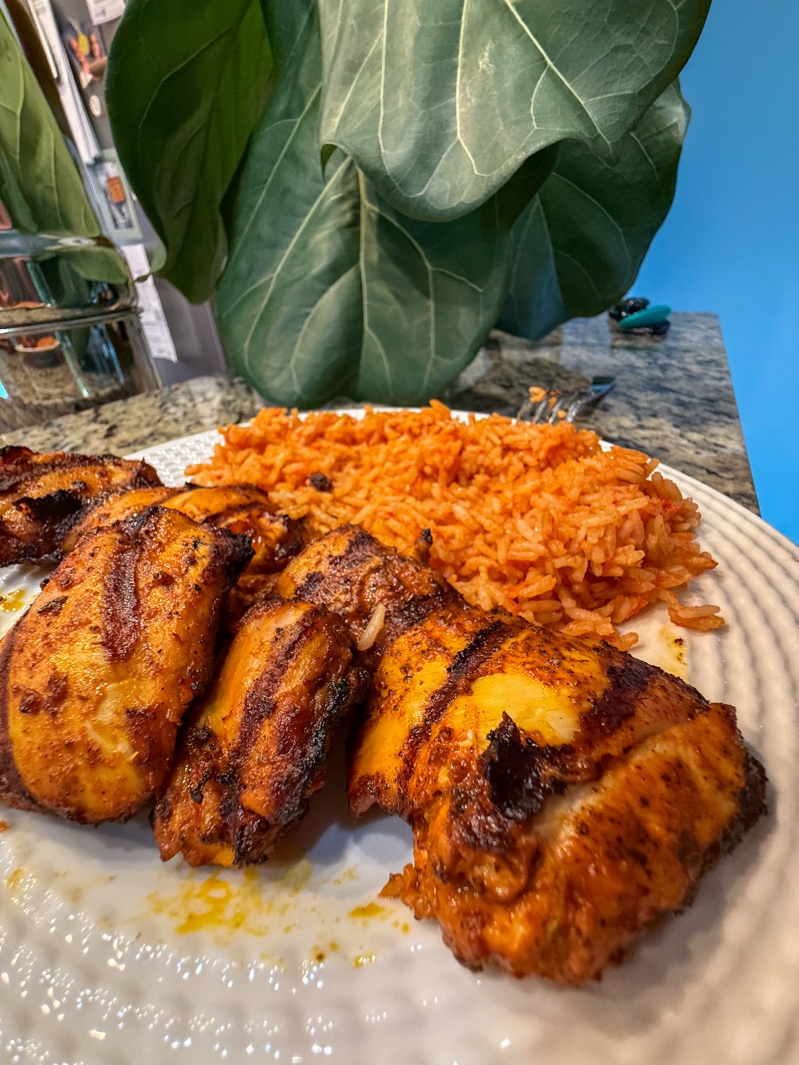 Grilled Chicken Thighs with Achiote Rub, Charred Lime and Mexican Rice
